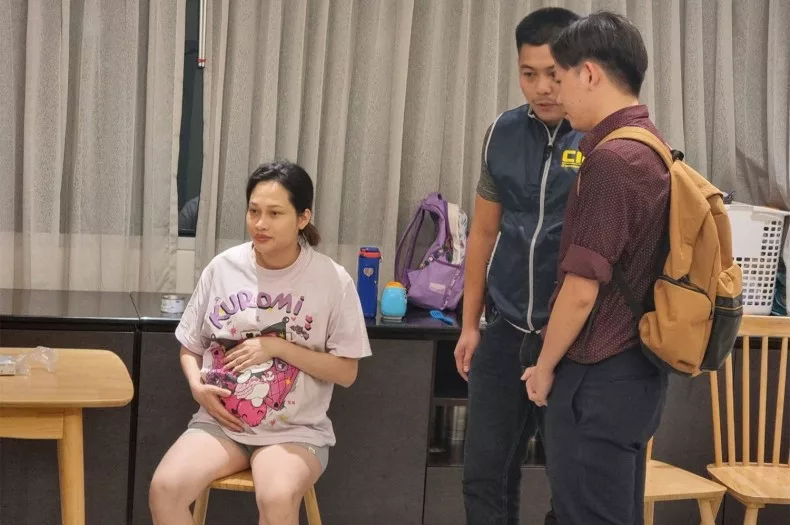 Ngo Thi Theu, alias “Madam Ngo”, a Vietnamese national, wanted by Interpol for cryptocurrency and forex scams that resulted in more than $300 million in losses, is taken into custody at a hotel in Watthana district of Bangkok on Friday.